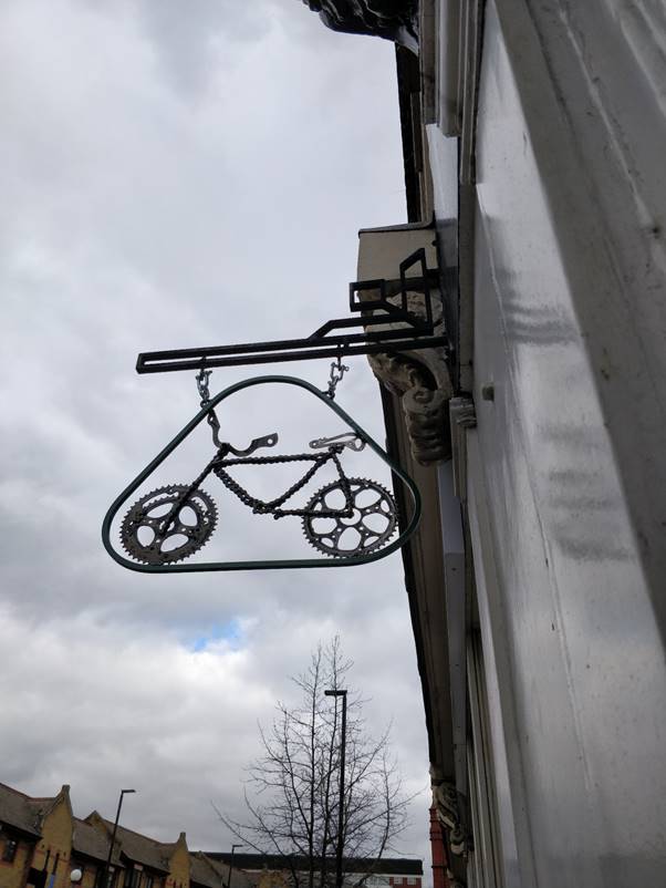 A picture containing sky, outdoor, street, basketball Description automatically generated