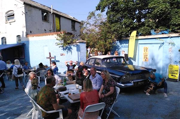 Creative Mile people at tables