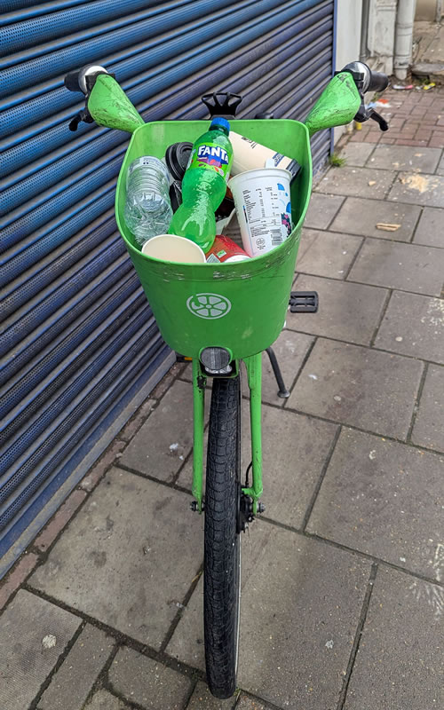 Lime bike used as bin 