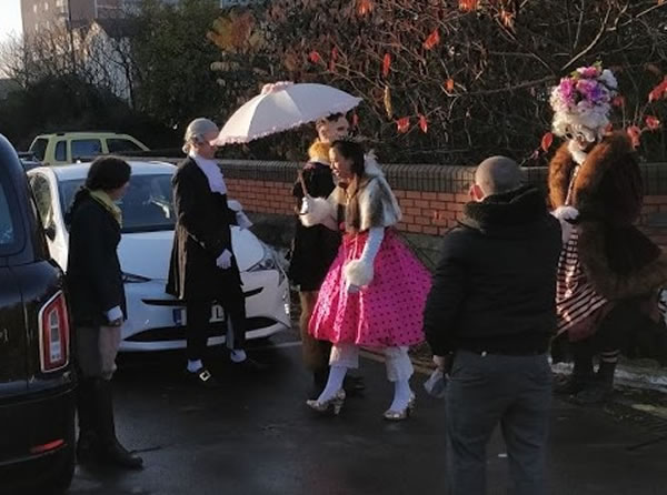 A picture containing outdoor, person, people, group Description automatically generated