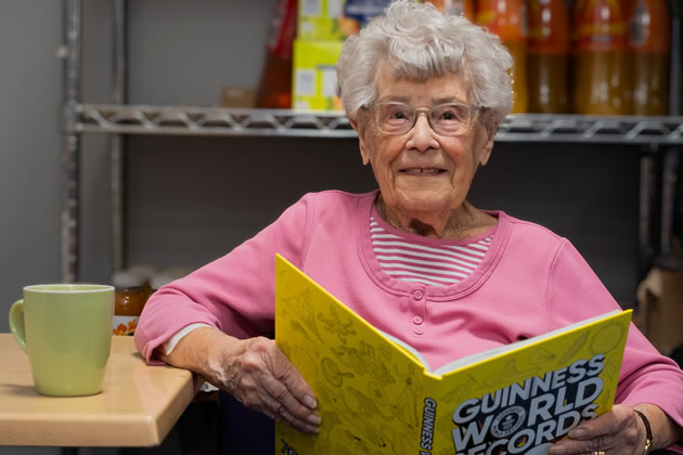 Beryl (103) checks her entry in the Guinness Book of Records