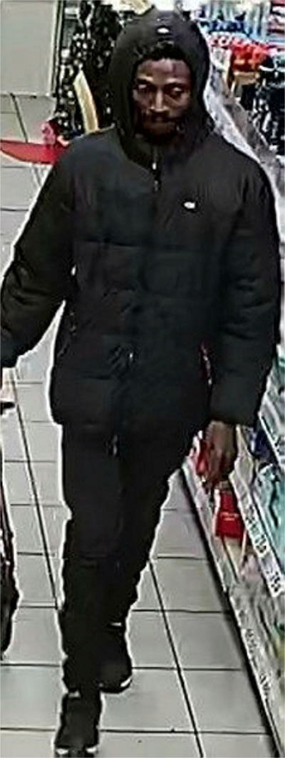 A full length photo of the man sought 