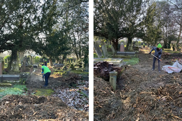 Volunteers laying woodchip from recycled Christmas trees on the side paths of Old Cemetery