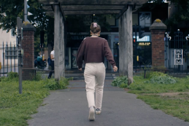 Nadia walks out of Dean Gardens