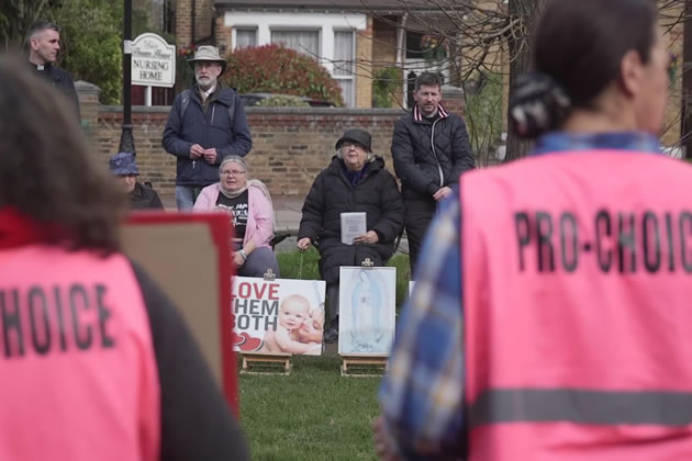 Pro-choice demonstrators face the pro-life vigil