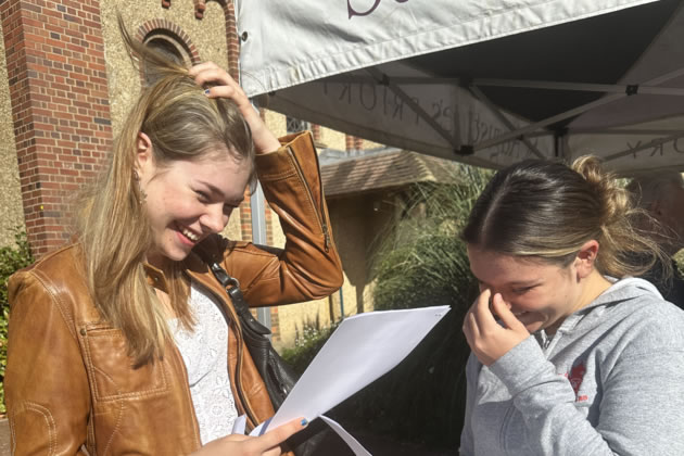 St Augustine&rsquo;s pupils open their results envelopes. Picture: St Augustine's Priory