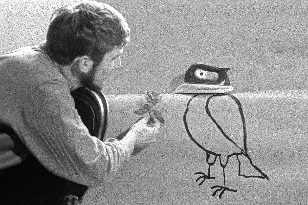 Cartoonist Tomi Ungerer in his SoHo home in New York City, making a bird from an electric iron, 1958.