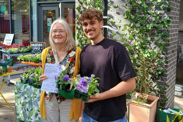 WE Grow offers free potted plants outside Mahaba Cafe 