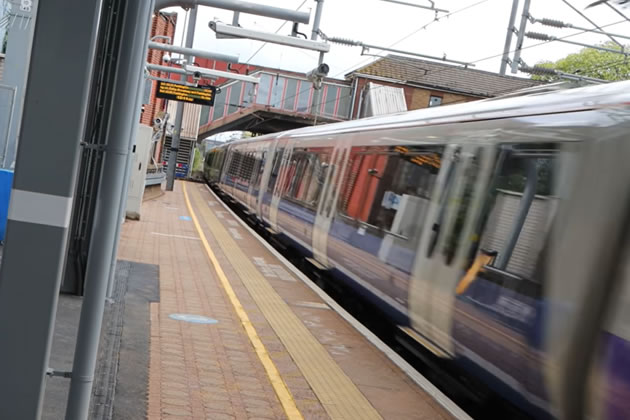 A train passing through West Ealing station
