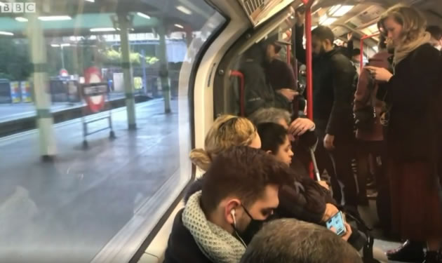 Tube passengers pictured before facemasks were mandatory