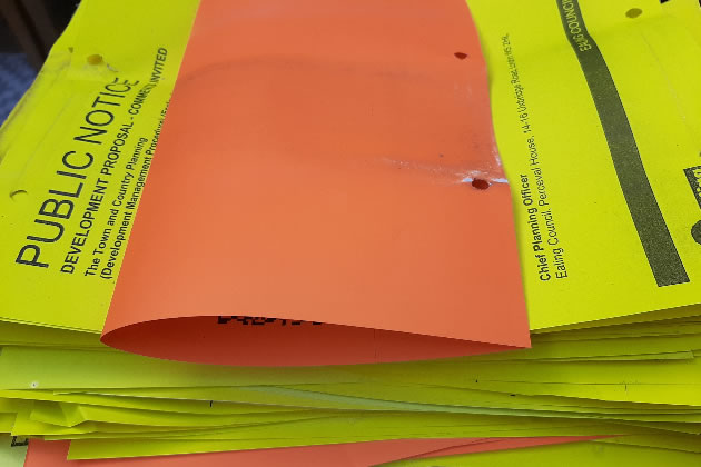 The pile of notices collected by Councillor Steed