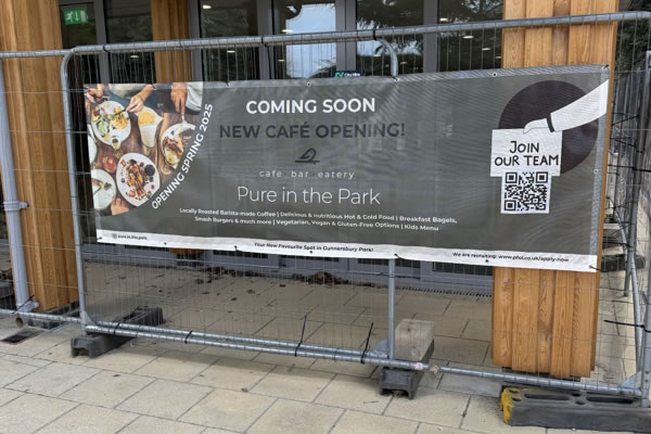 Banner advertising the launch of the new cafe
