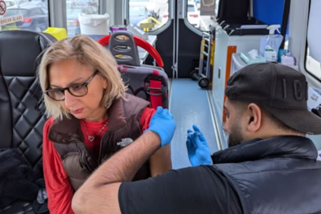 Councillor Lily Bath getting vaccinated with the Health Outreach Team
