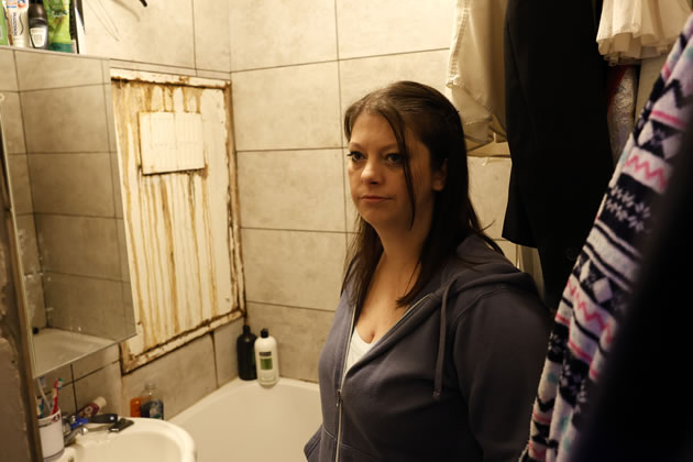 Stacey Watson in her bathroom